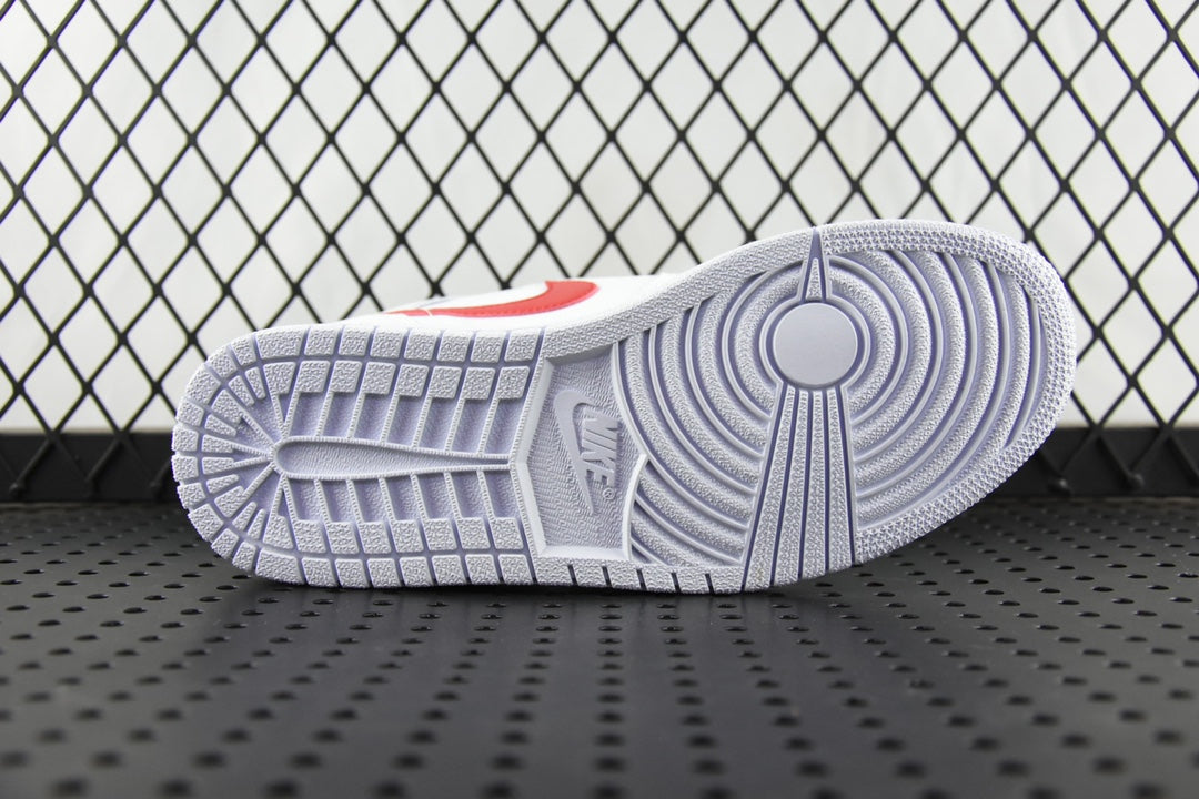 White rubber outsole with textured tread and central traction pattern.