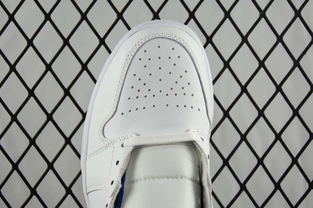 White perforated toe cap with front seam and lace eyelets.