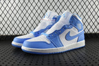 Pair of mid-top basketball shoes in white and light blue with blue swoosh