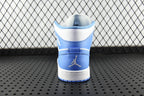 Back view of mid-top basketball shoe in white with light blue ankle collar