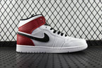 Mid-top sneaker side view with red quarter panels, black swoosh on white leather