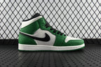 Air Jordan 1 Mid green and white high-top sneaker, angled side view