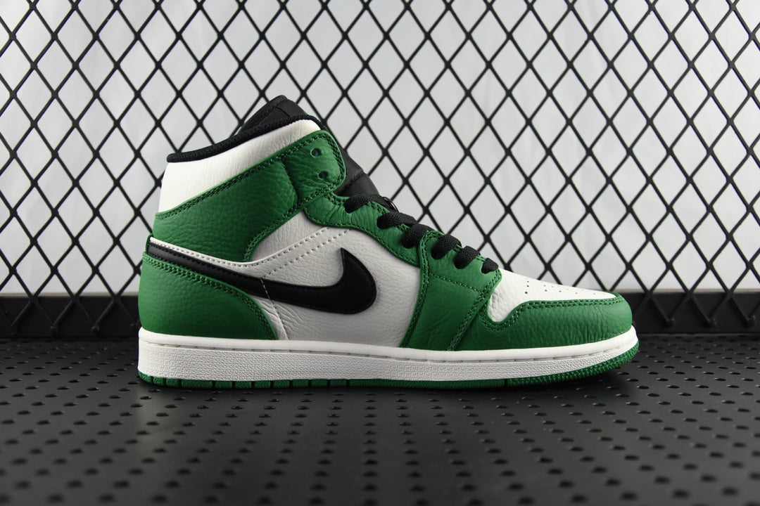 Air Jordan 1 Mid green and white high-top sneaker, angled side view
