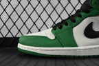 Air Jordan 1 Mid green and white sneaker detail with black swoosh and stitching