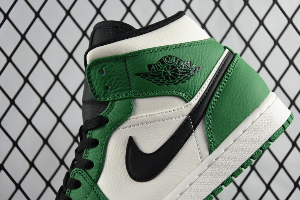 Air Jordan 1 Mid green leather panel with black swoosh and Air logo