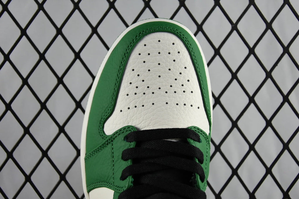 Air Jordan 1 Mid green and white toe box with perforations and black laces