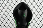 Air Jordan 1 Mid black heel collar with green accents and Air branding