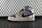 Air Jordan 1 Mid high-top sneakers, light gray suede with black swoosh and iridescent trim
