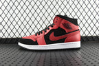 Mid-top leather sneaker with red and black panels, black laces, white sole
