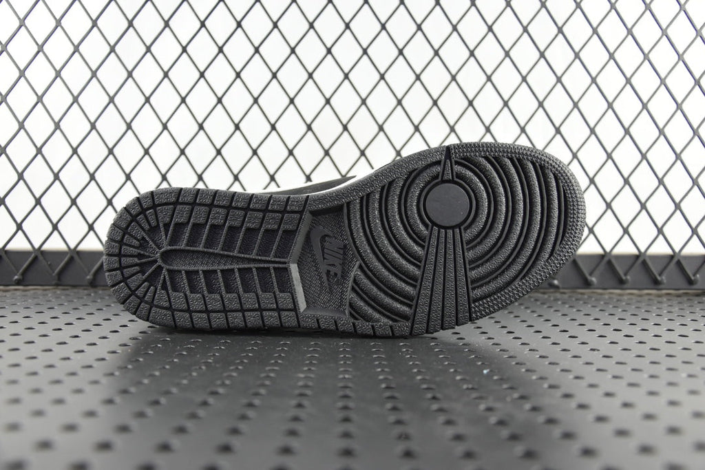 Black rubber outsole for mid-top sneakers with circular traction pattern