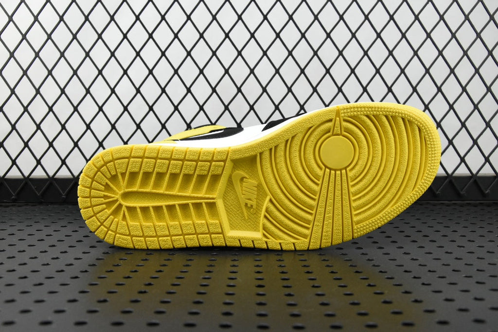 Air Jordan sneaker outsole in yellow with textured traction pattern