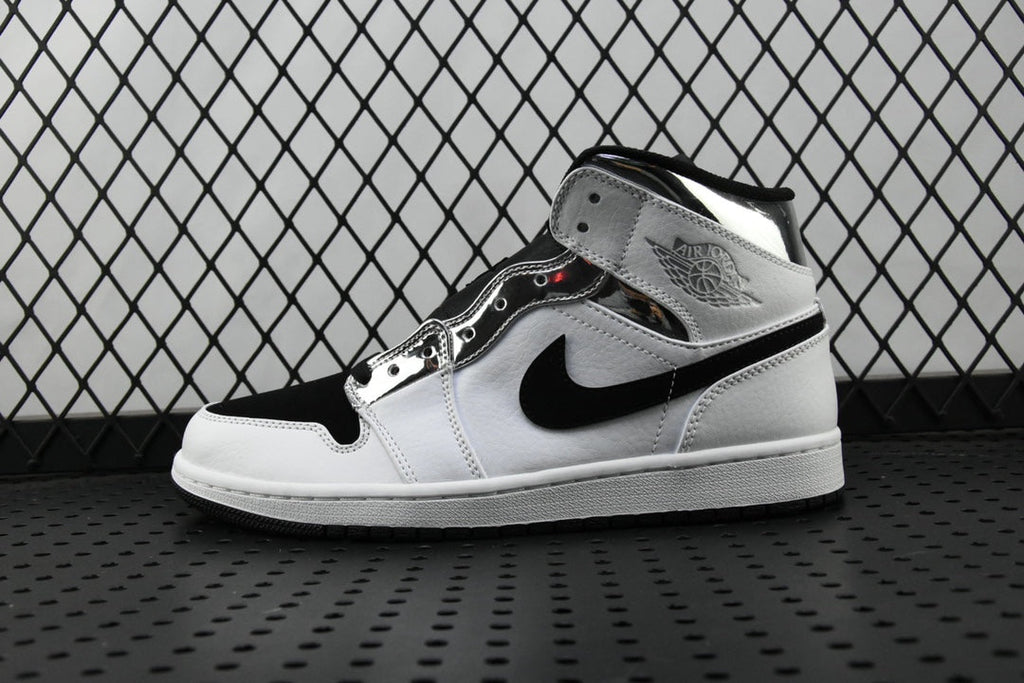 Air Jordan 1 Mid sneakers in white and black, high-top side view with swoosh