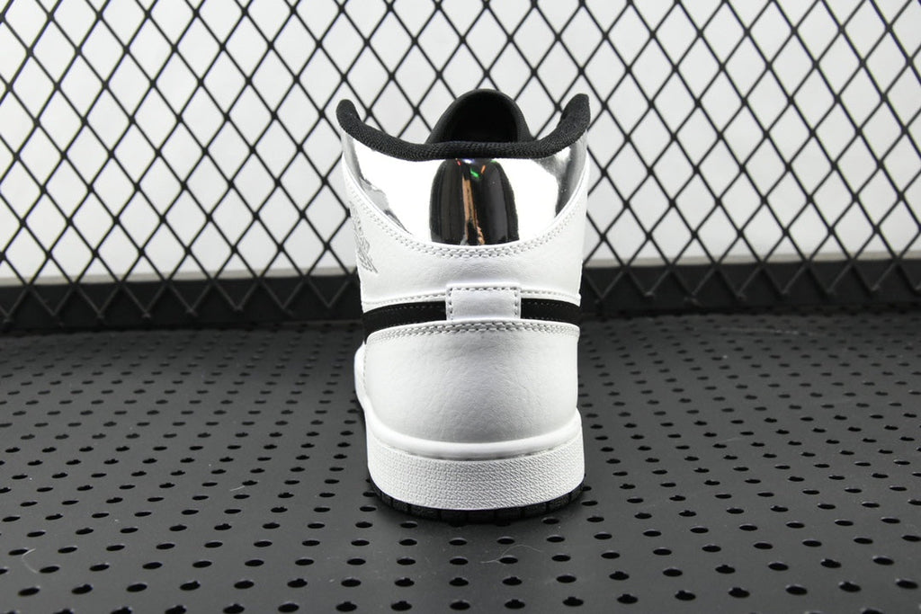 Air Jordan 1 Mid sneakers, rear view with white heel and black collar padding