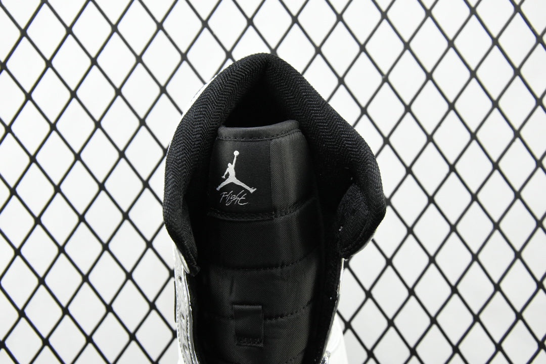 Air Jordan 1 Mid sneakers, heel back with Jumpman logo on black insole lining