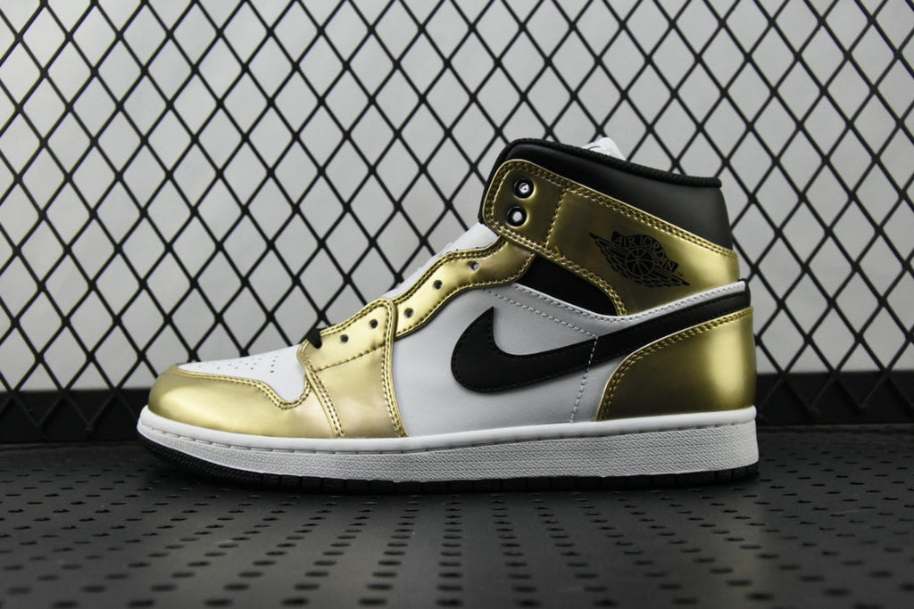 Mid-top sneaker with metallic gold and white panels, black Nike swoosh, black collar