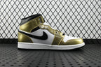 Mid-top Air Jordan sneaker with metallic gold leather, white panels, and black swoosh