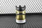 Back view of mid-top sneaker with metallic gold heel and white sole, black collar