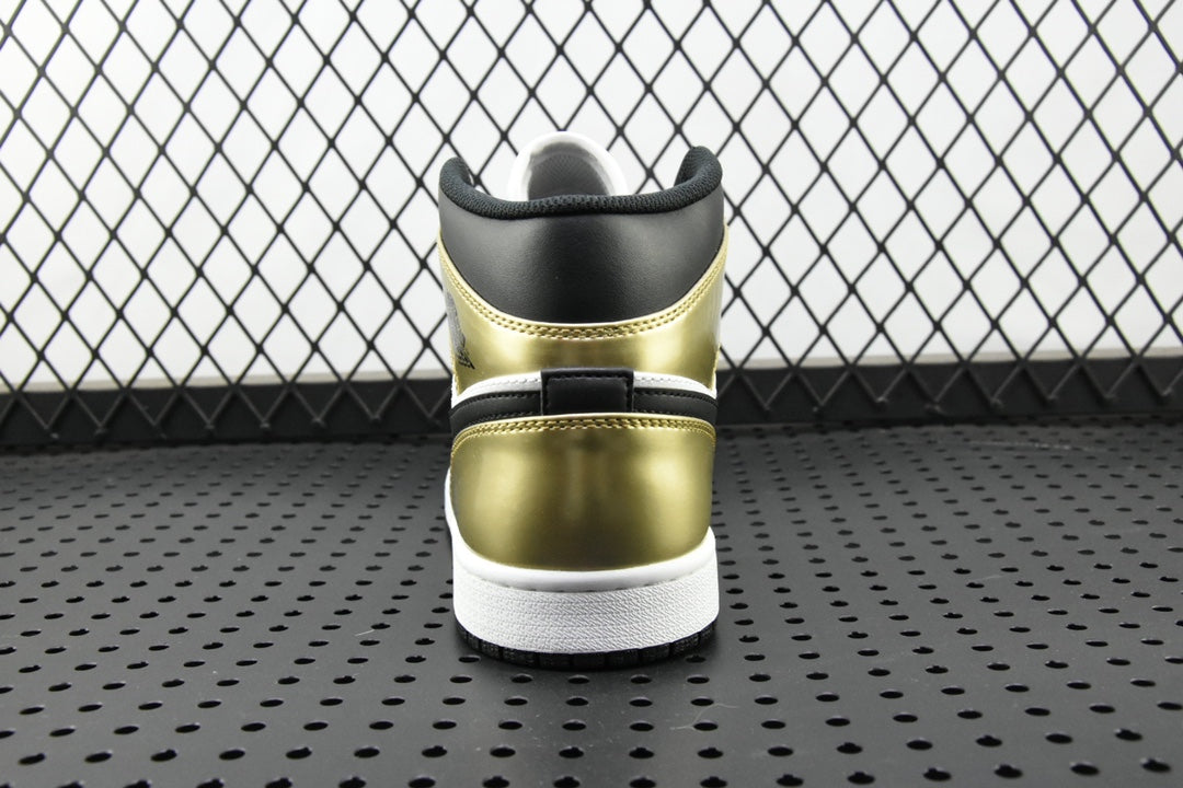 Back view of mid-top sneaker with metallic gold heel and white sole, black collar