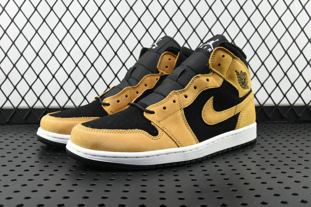 Air Jordan 1 Mid sneakers in black and desert ochre, lace-up with Nike swooshes