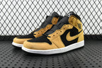 Air Jordan 1 Mid sneakers in black and desert ochre, lace-up with Nike swooshes