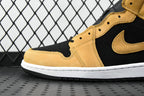 Air Jordan 1 Mid sneaker toe and side panel, desert ochre suede and black accents