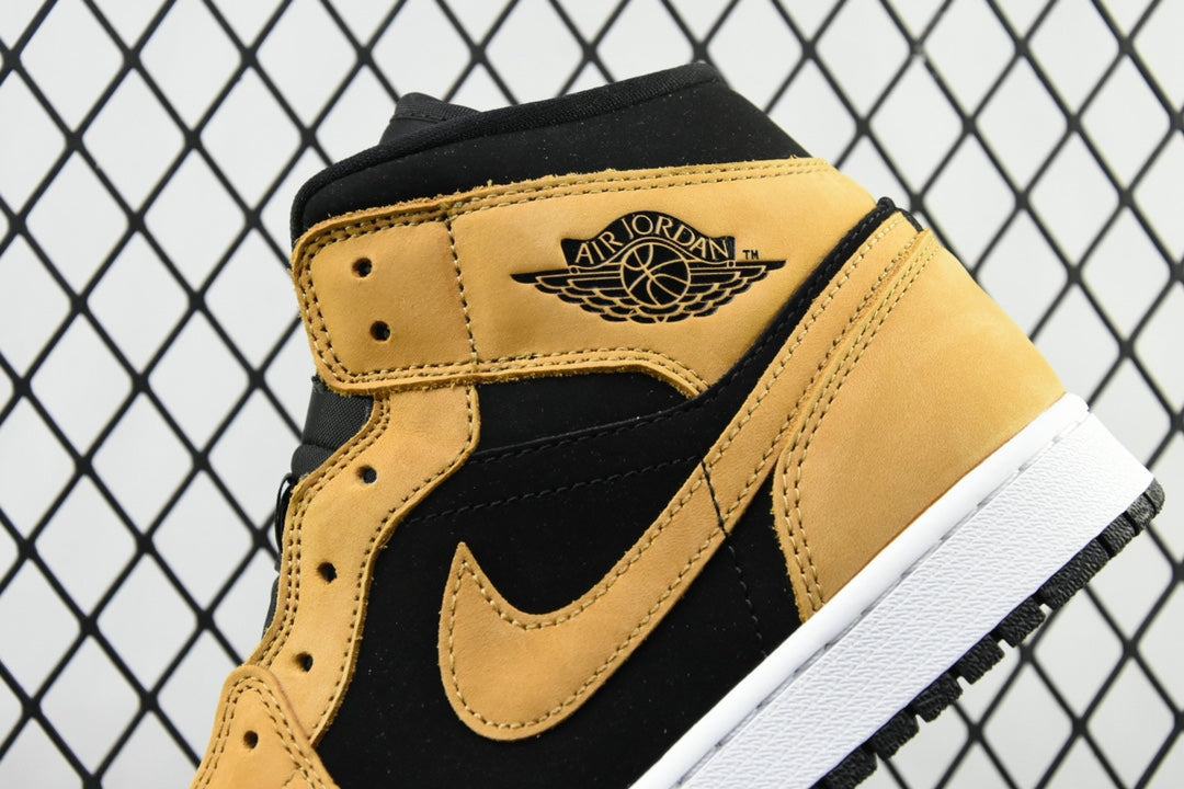 Air Jordan 1 Mid sneaker ankle area, desert ochre and black leather with Air Jordan logo