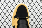Air Jordan 1 Mid sneaker opening, black tongue and eyelets with desert ochre leather