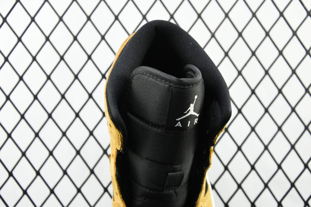 Air Jordan 1 Mid sneaker heel, black leather collar with Air and Jordan branding