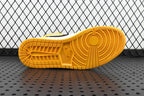 Air Jordan 1 Mid sneakers, yellow rubber outsole with textured tread pattern