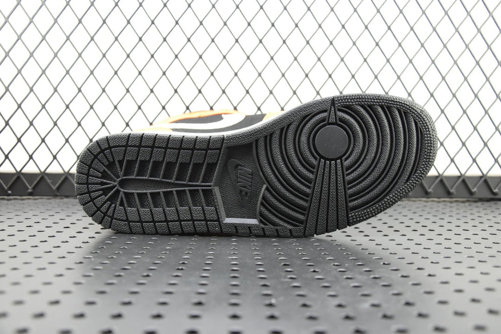 Shoe outsole with dark gray tread featuring circular pattern and segmented grooves