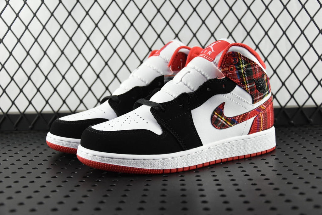 Mid-top sneakers, white toe and black side panels with red plaid collar and red sole