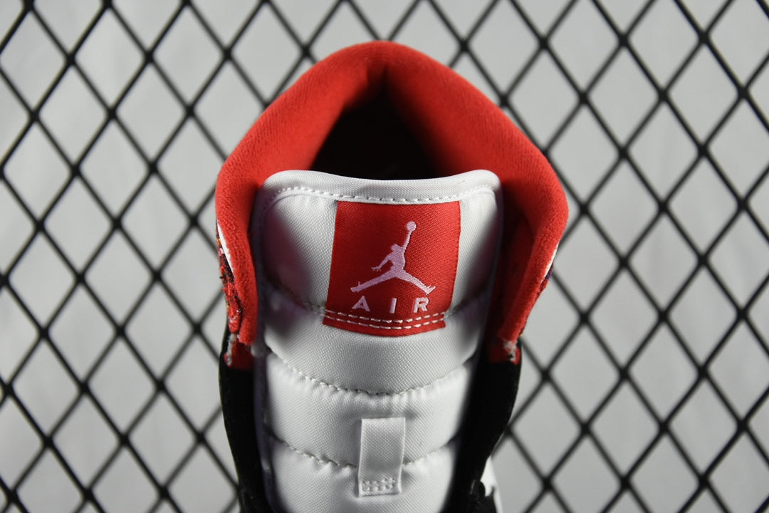 Mid-top sneakers with red collar lining and Air Jordan logo on white tongue