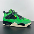 Green and black Air Jordan 4 sneaker with lace-up front and white midsole