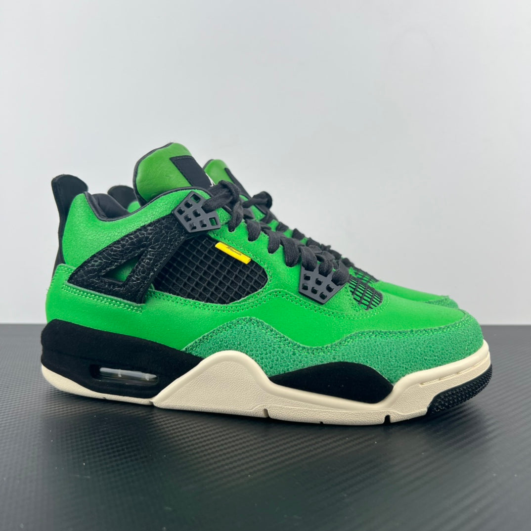 Green and black Air Jordan 4 sneaker with lace-up front and white midsole