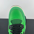 Air Jordan 4 sneaker rear view with black laces and green heel overlay