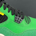 Neon green lace-up sneaker with black heel cage and textured quarter panel