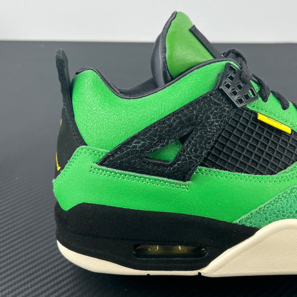 Neon green and black lace-up sneaker with visible air unit and white sole