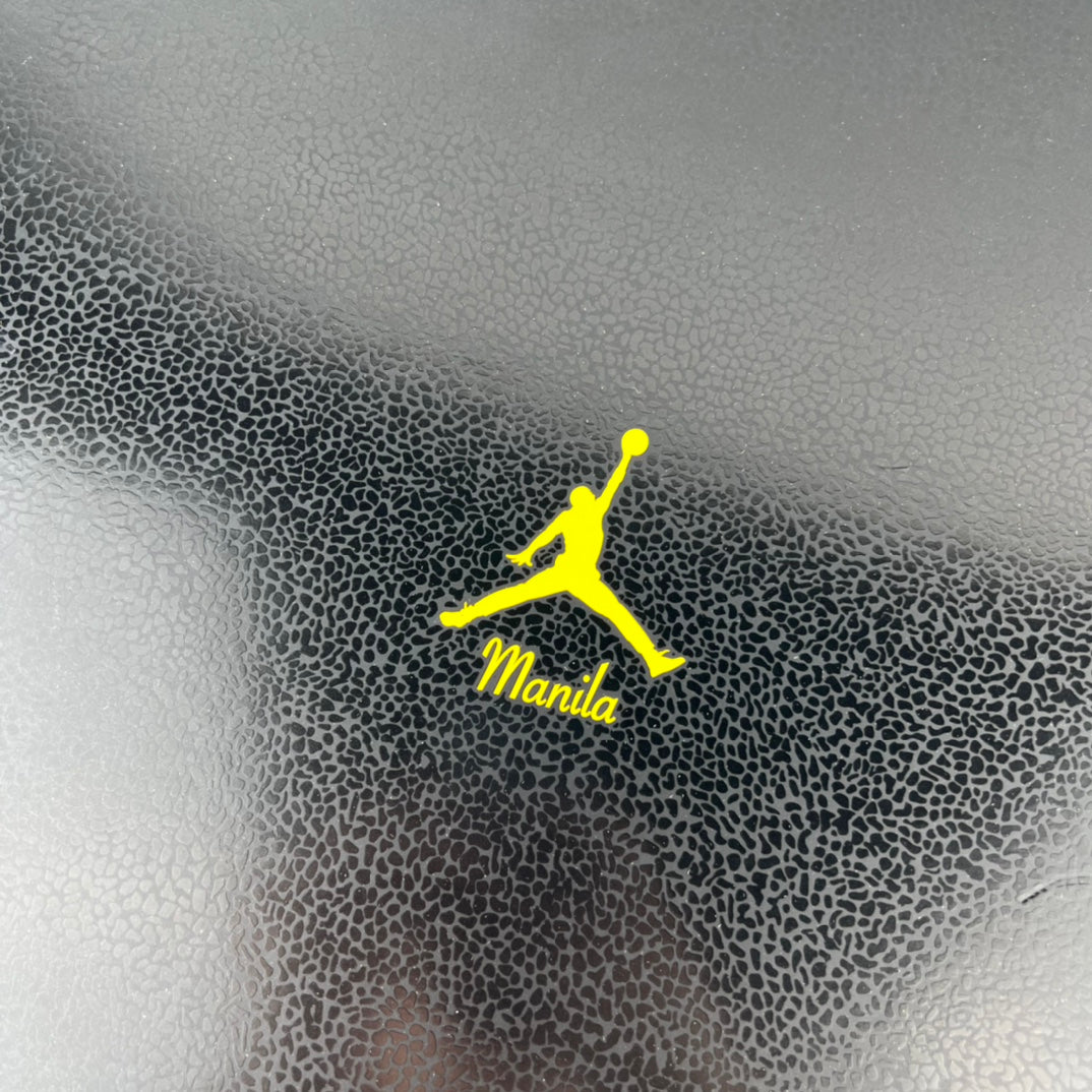 Neon yellow Jumpman logo and Manila text on gray fabric patch