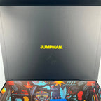 Air Jordan 4 sneaker box lid with Jumpman logo and colorful graphics