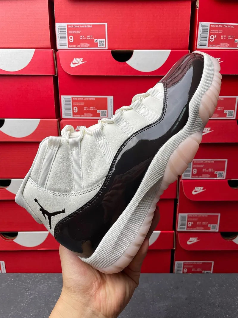 White and black high-top lace-up sneaker angled view with glossy side panel and logo