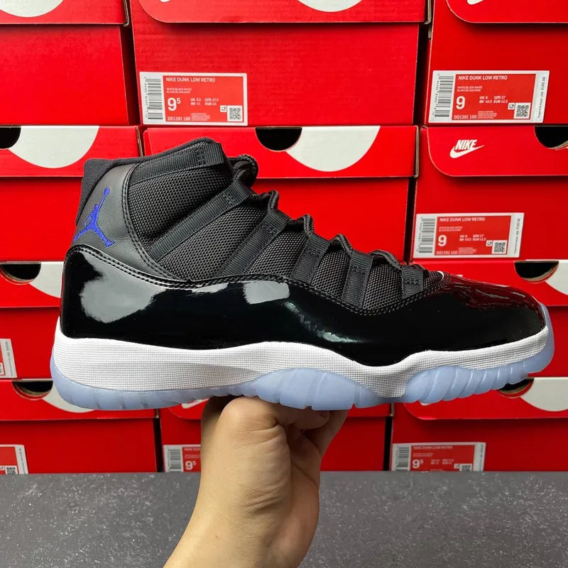 Black high-top basketball sneaker with mesh panels, lace-up, and white-blue sole