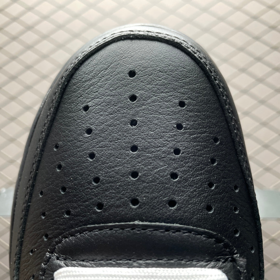 Black sneaker toe with perforation holes and smooth stitched toe cap