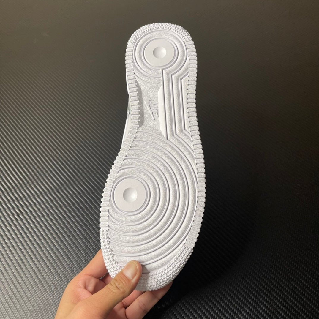 White sneaker outsole bottom with circular traction patterns