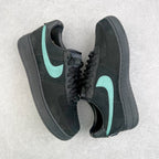 Air Force 1 sneaker angled view in dark gray with teal swoosh and black laces.