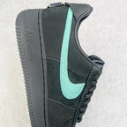 Air Force 1 side view showing black upper, teal swoosh, and AIR-mark midsole.
