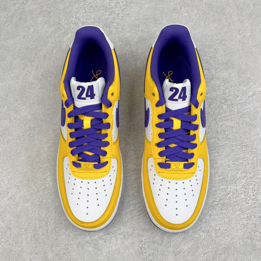 Yellow, purple, and white high-top sneakers with lace-up front and Air branding on tongue