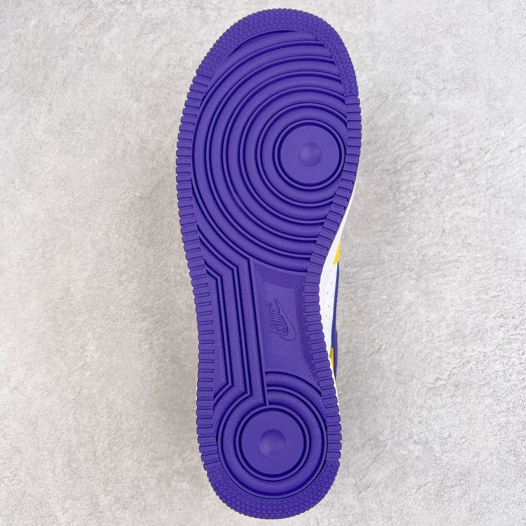 Purple rubber outsole with circular traction pattern and molded channels