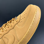 Yellow Air Force 1 sneaker with perforated toe and side swoosh detail
