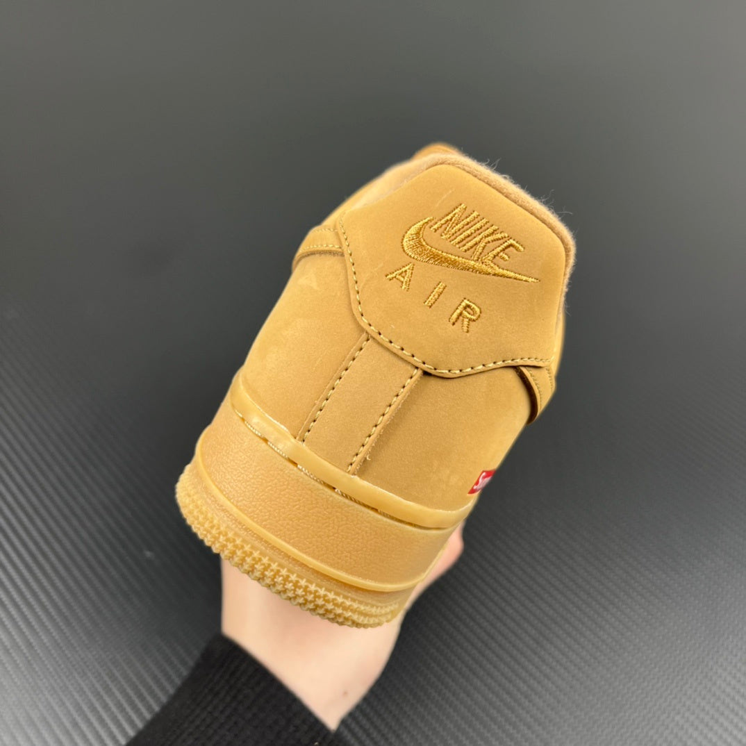 Yellow Air Force 1 sneaker heel with Nike swoosh and AIR branding