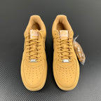 Pair of yellow Air Force 1 sneakers with lace-up closure and perforated toe